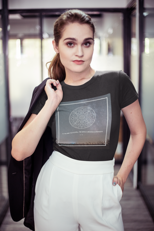 When you don’t dress like everybody else, you don’t have to think like everybody else. Show the world when the mind that is still, the whole universe surrenders. Get this t-shirt, and have a mantra to live by.